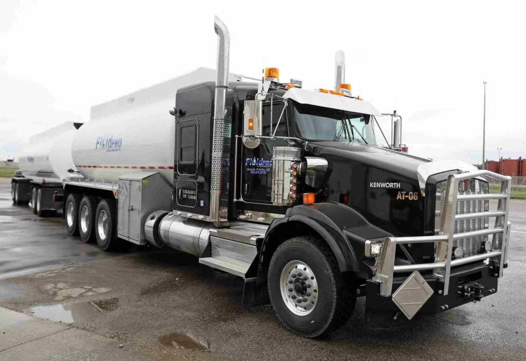FluidPRO acid truck in Alberta oilfield, Front & Right Side View Shot